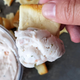 hand holding chip with dip
